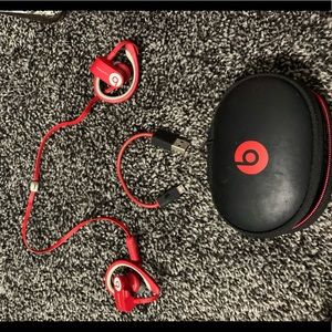 Red Beats Wireless earbuds